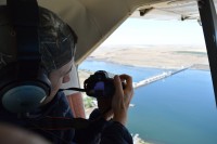 Senior Attorney, Miles Johnson, flying over McNary Dam. Aerial support from Lighthawk