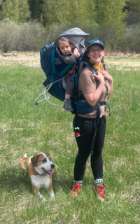 Liz Terhaar, Communications Director, hiking with her dog, Blaze, and daughter, Zuma in Montana; photo credit: Jon Terhaar.