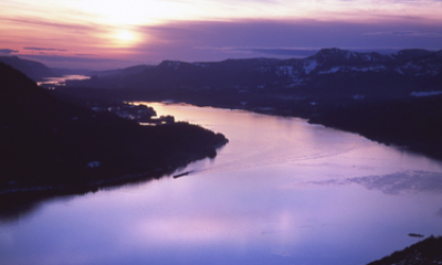 A purple sunset over a bend in the Columbia River