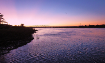 Sunset at Hanford Reach, shows river and purple sky, very beautiful