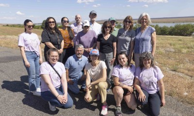 Riverkeeper Staff and supporters at the 3rd annual Hanford Journey event, pose along the Hanford Reach opposite the Hanford Nuclear Site. 